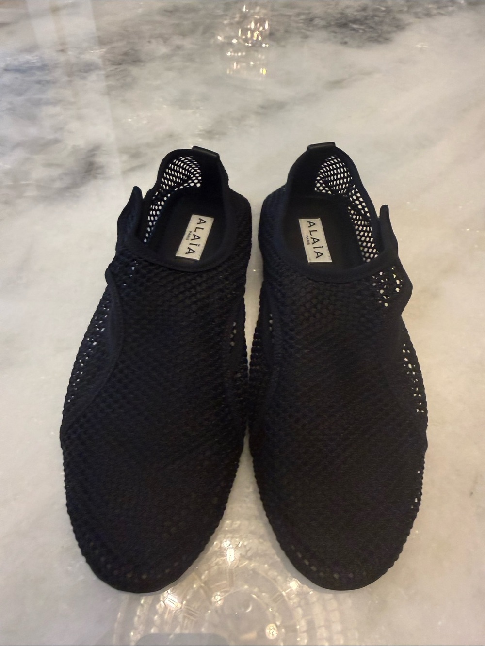 ALAÏA Black Mesh Slip-Ons